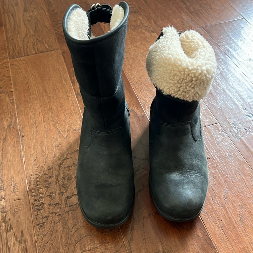 NEVER WORN UGG all whether boots.   Size 7.5